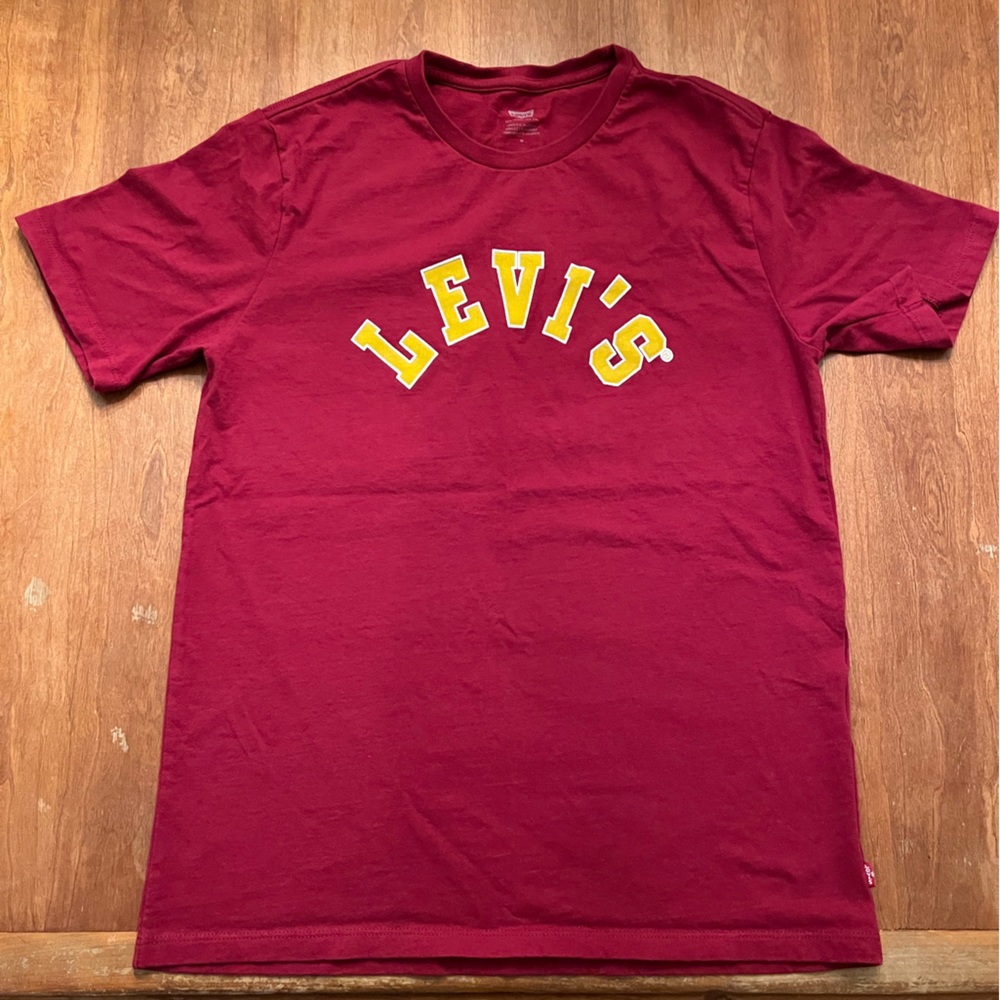 red Levi’s t-shirt with yellow lettering
